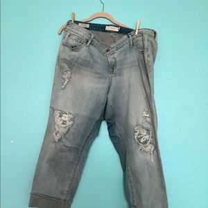 Ripped jeans with lace covering